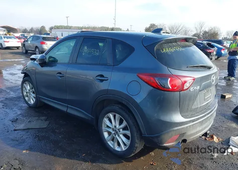 2013 Mazda Cx-5 Grand Touring z USA, uszkodzony, nr VIN JM3KE2DEXD0156216
